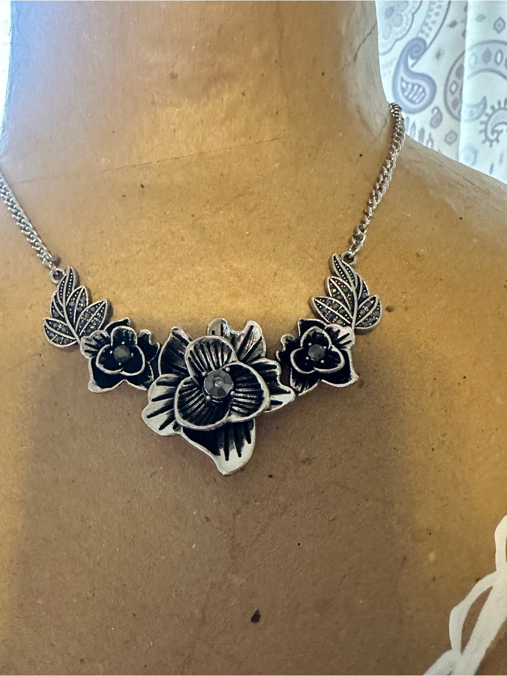 Silver Floral Pendant Necklace with Black Accents